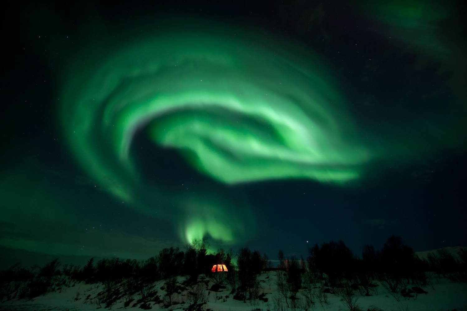 northern lights above the camp