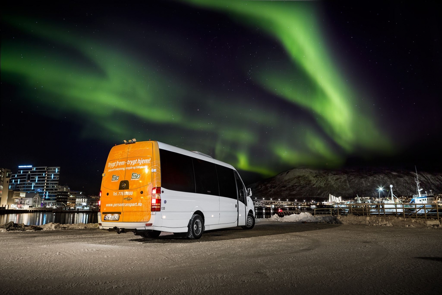 the mini bus under northern lights