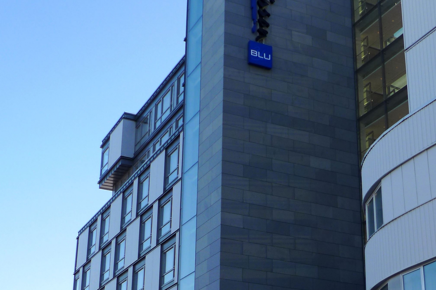 the hotels logo on the hotel building