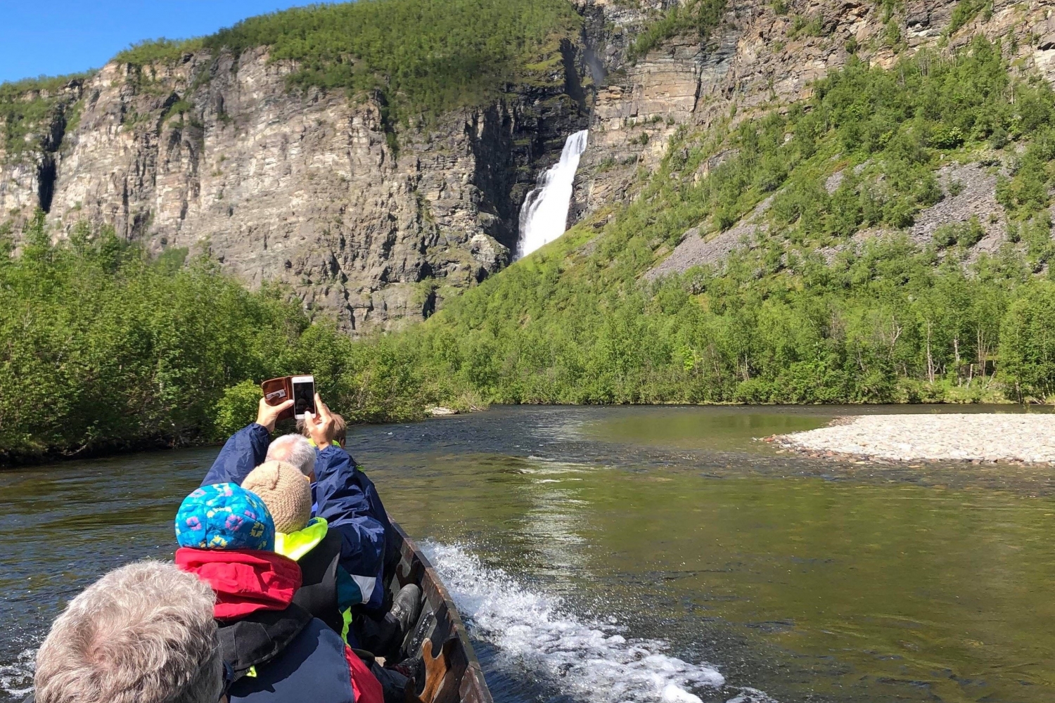Riverboat to spectacular Mollis waterfall in the Reisa National Park