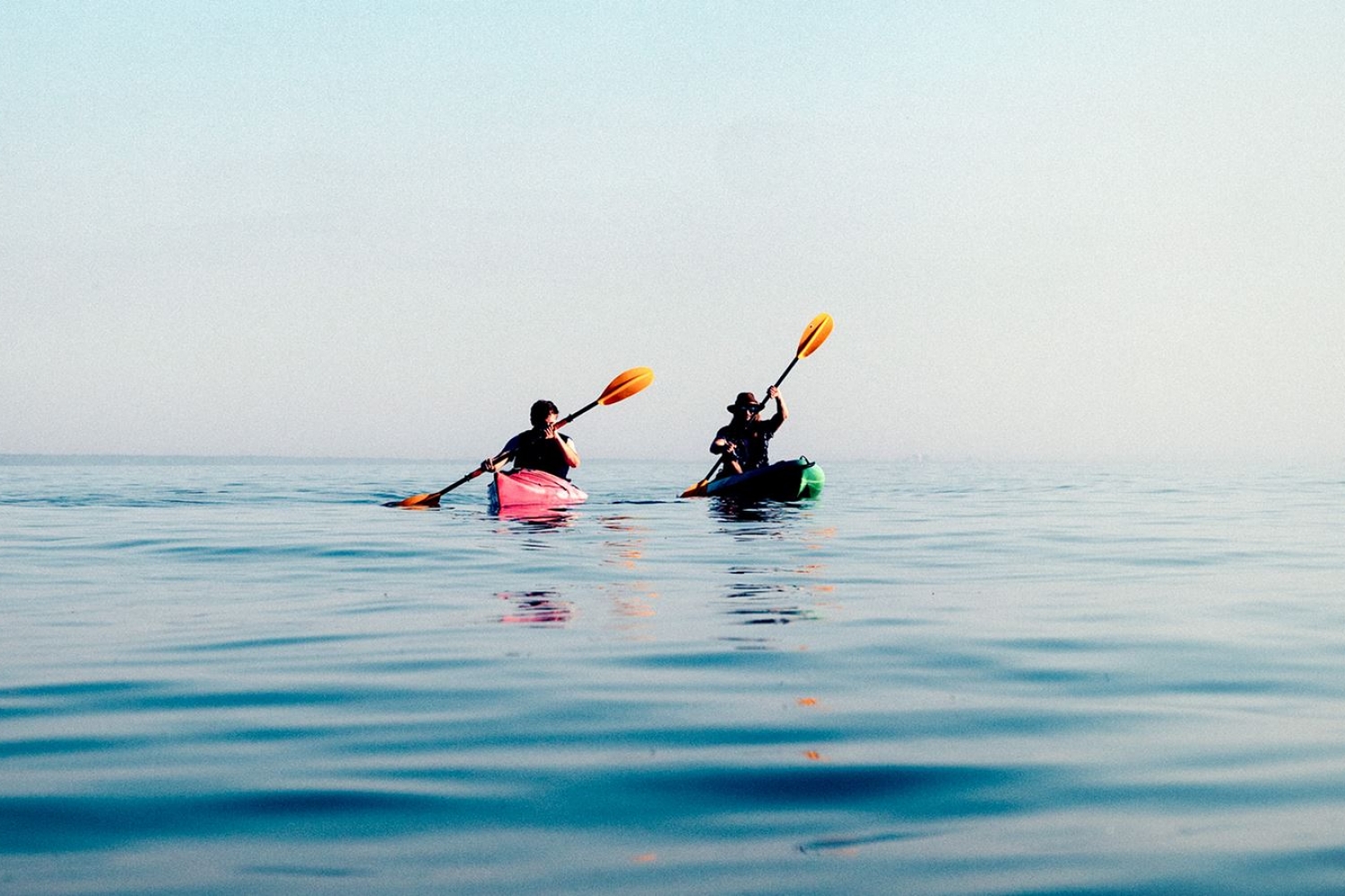 two people kayakking
