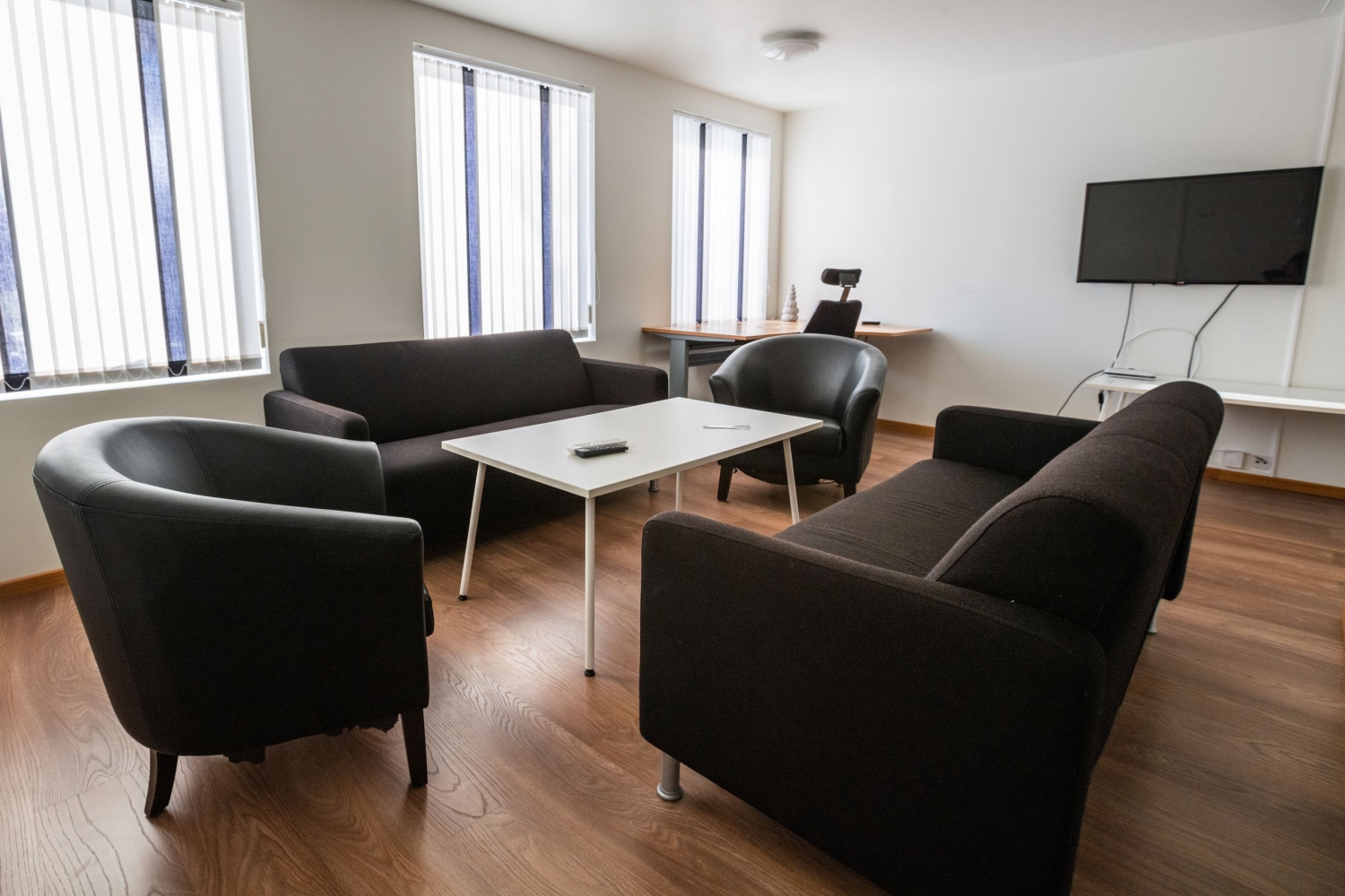 sofas and table in communal room