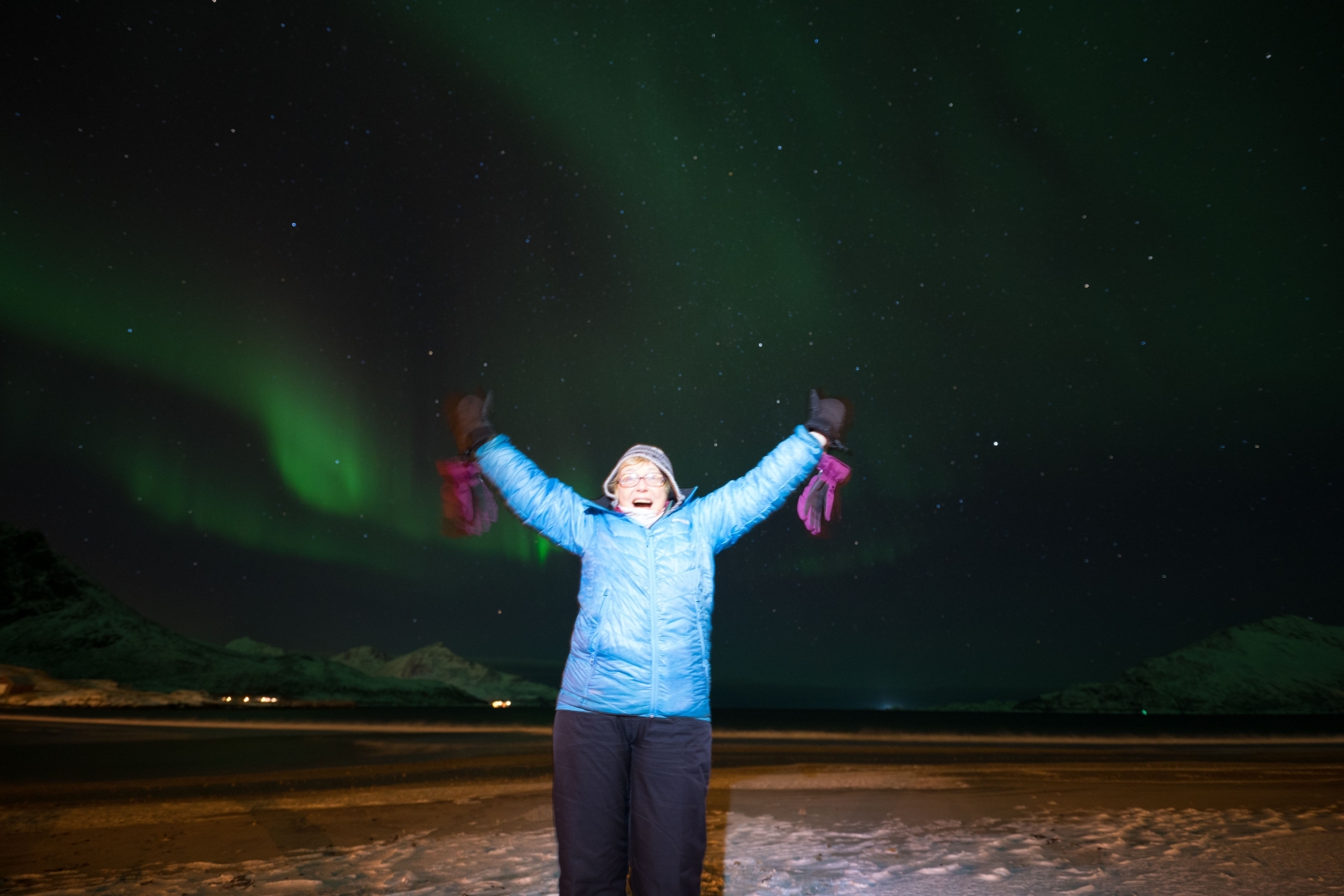 Northern Lights and happy person