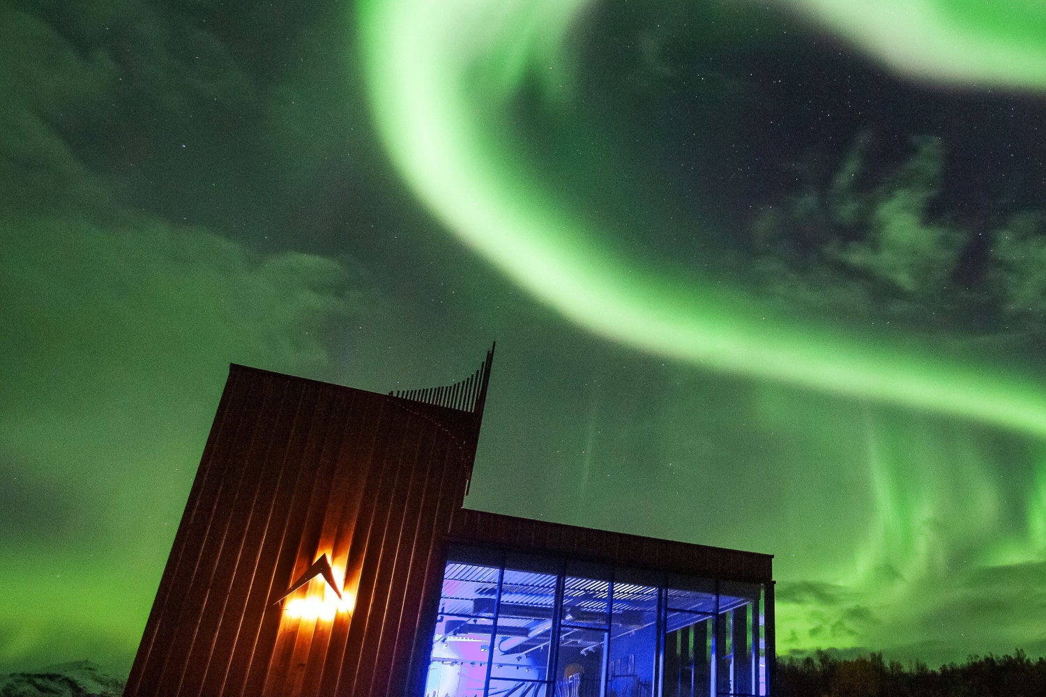 Northern Lights in the sky above distillery 