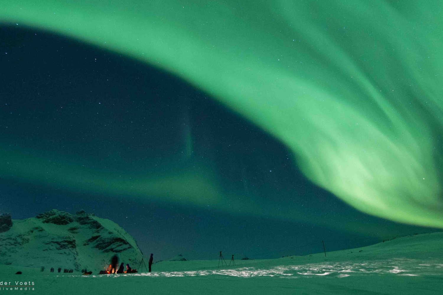 Northern lights above Arctic winter landscape